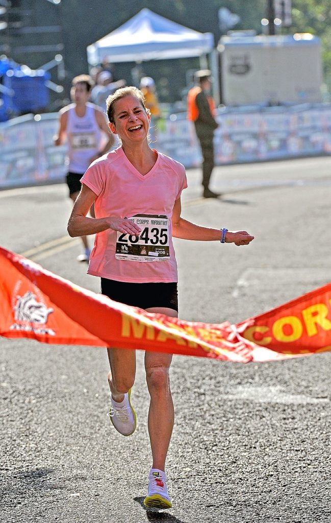 runner, finish line, female